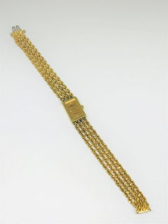 Ladies 14 Karat Gold and Diamond Baume & Mercier Watch