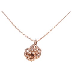 Ladies 14 Karat Rose Gold Round Diamond Flower Pendant