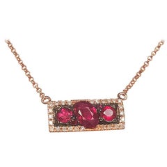 Ladies 14 Karat Rose Gold Rubies and Diamond Pendant