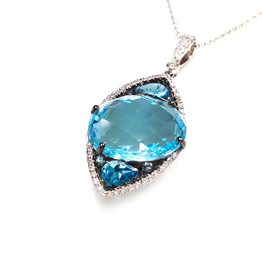 Ladies 14 Karat White Gold Blue Topaz and Diamond Pendant In New Condition For Sale In New York, NY