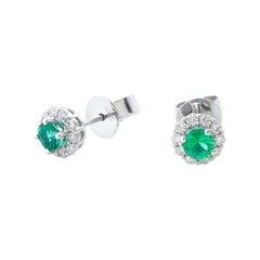 Ladies 14 Karat White Gold Emerald and Diamonds Stud Earring