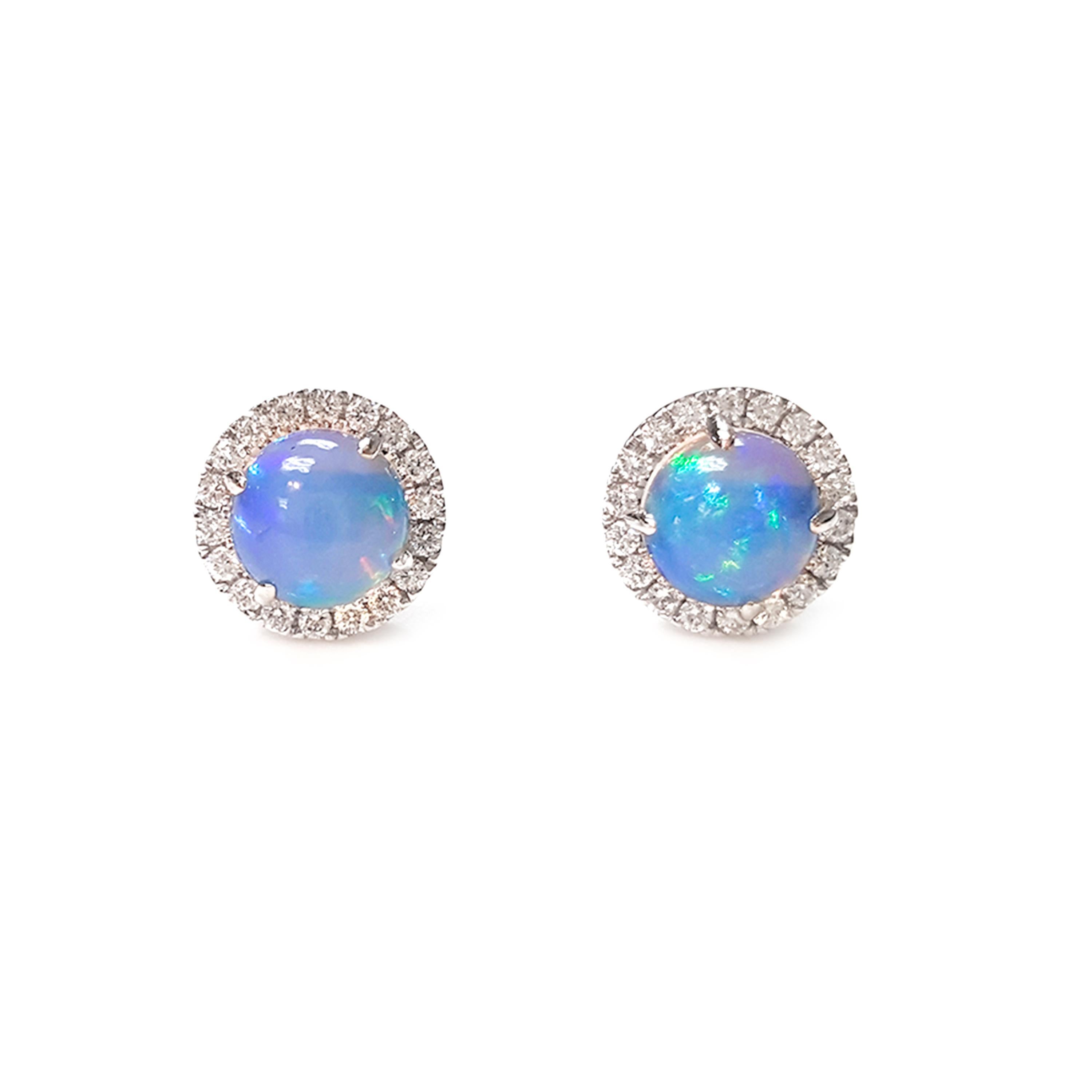 This Ladies 14k White Gold Opal and Diamonds Stud Earring has 2.03 carats of Opal and 0.39 carats of Diamonds. 