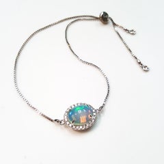 Ladies 14 Karat White Gold Oval Opal and Diamond Rolo Bracelet