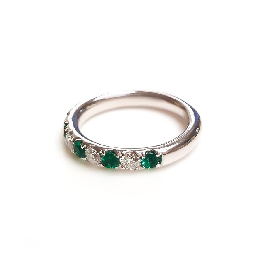 This ladies 14k white gold round emerald band has 0.36ct of perfectly matched round emeralds and 0.45ct of perfectly matched round diamonds. Comfort fit band for everyday use. Ring size 7
