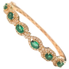 Ladies 14 Karat Yellow Gold Emerald and Diamond Bangle Ladies 14 Karat Yellow Gold Emerald and Diamond Bangle