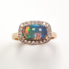Ladies 14 Karat Yellow Gold Ethiopian Opal and Diamonds Ring