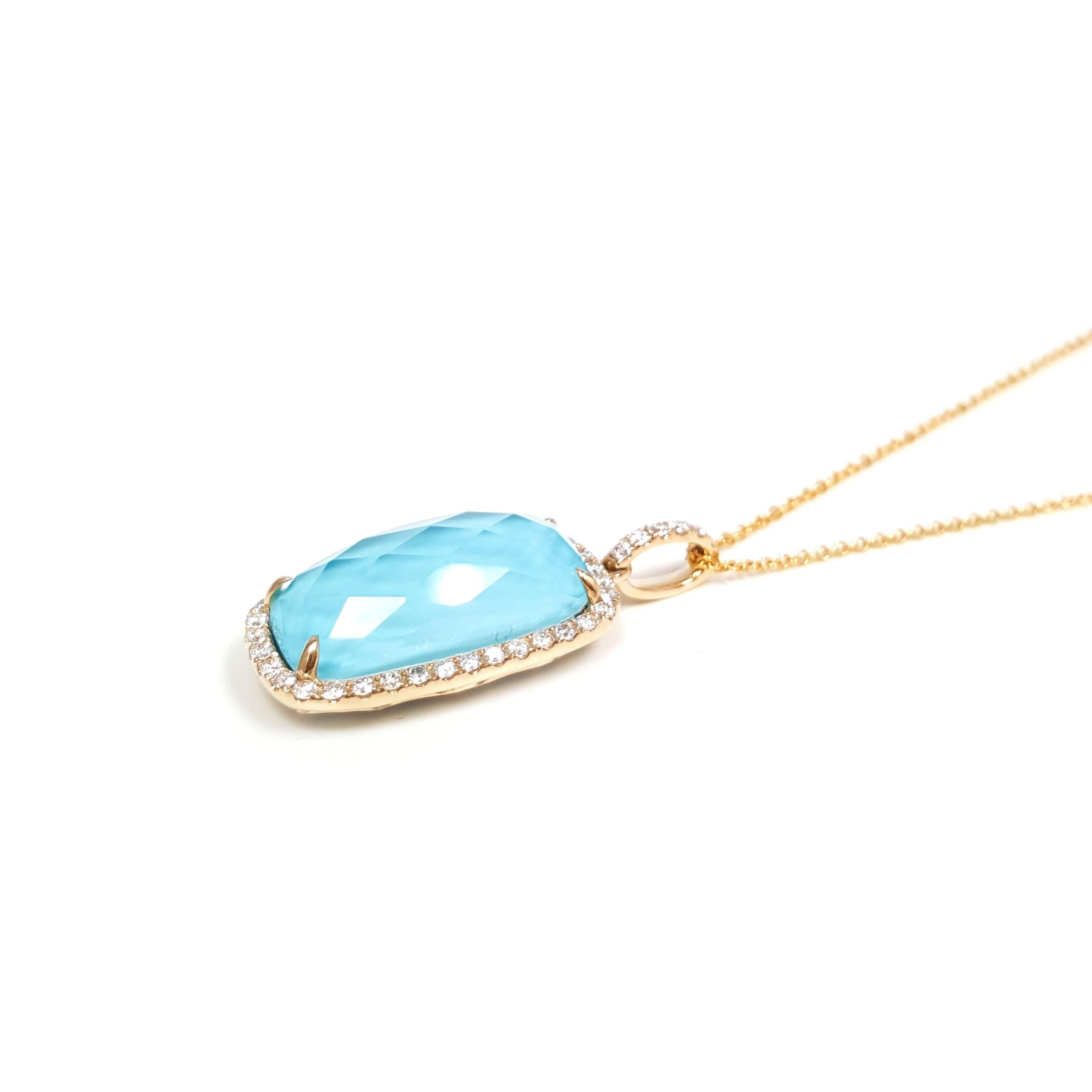 This ladies 14k yellow gold turquoise and round diamond pendant has 7.71ct turquoise and 0.34ct round diamonds. This pendant is truly charming and perfect for any special occasion.