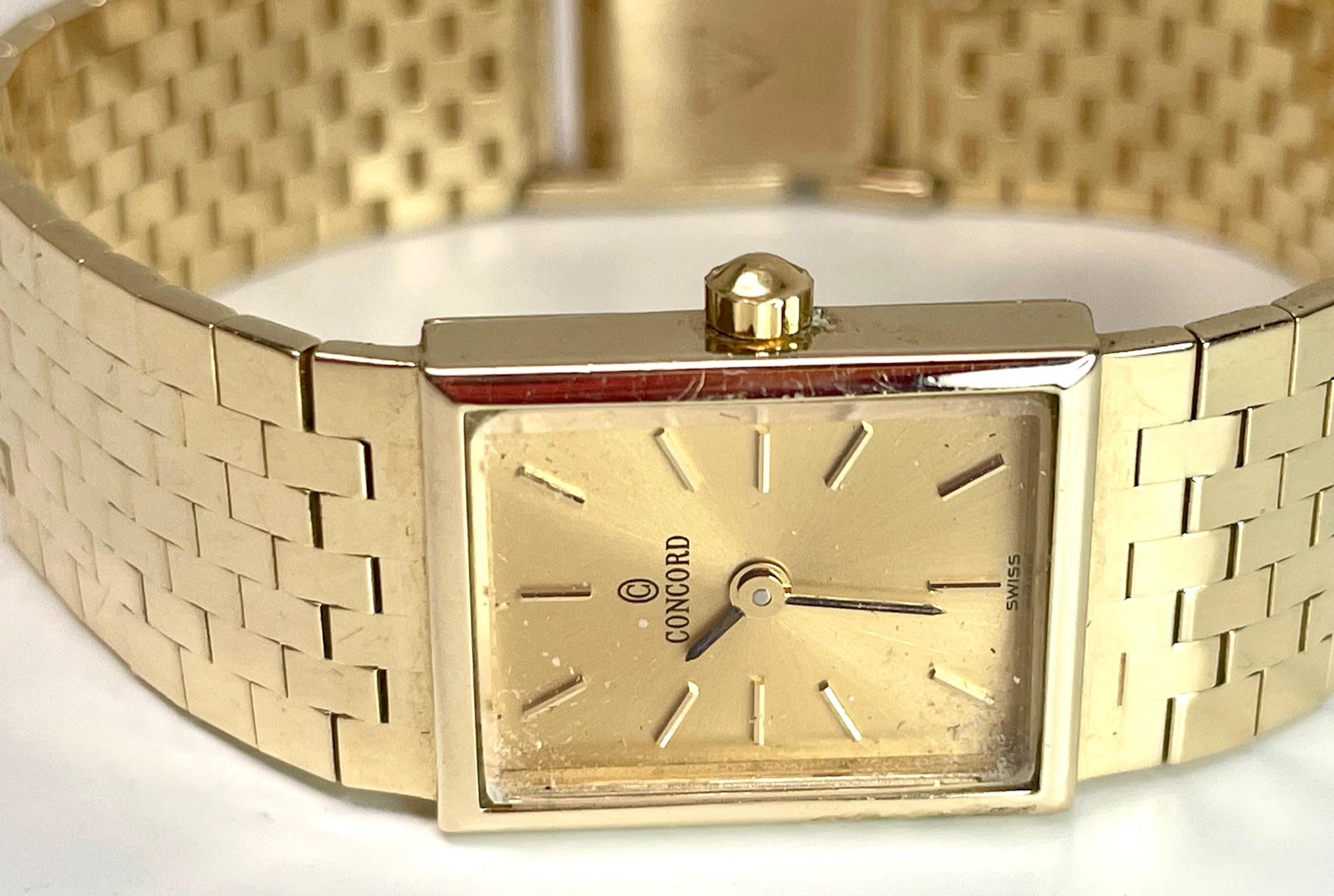 14kt yellow gold Ladies' wristwatch by Concord. This 6 1/4