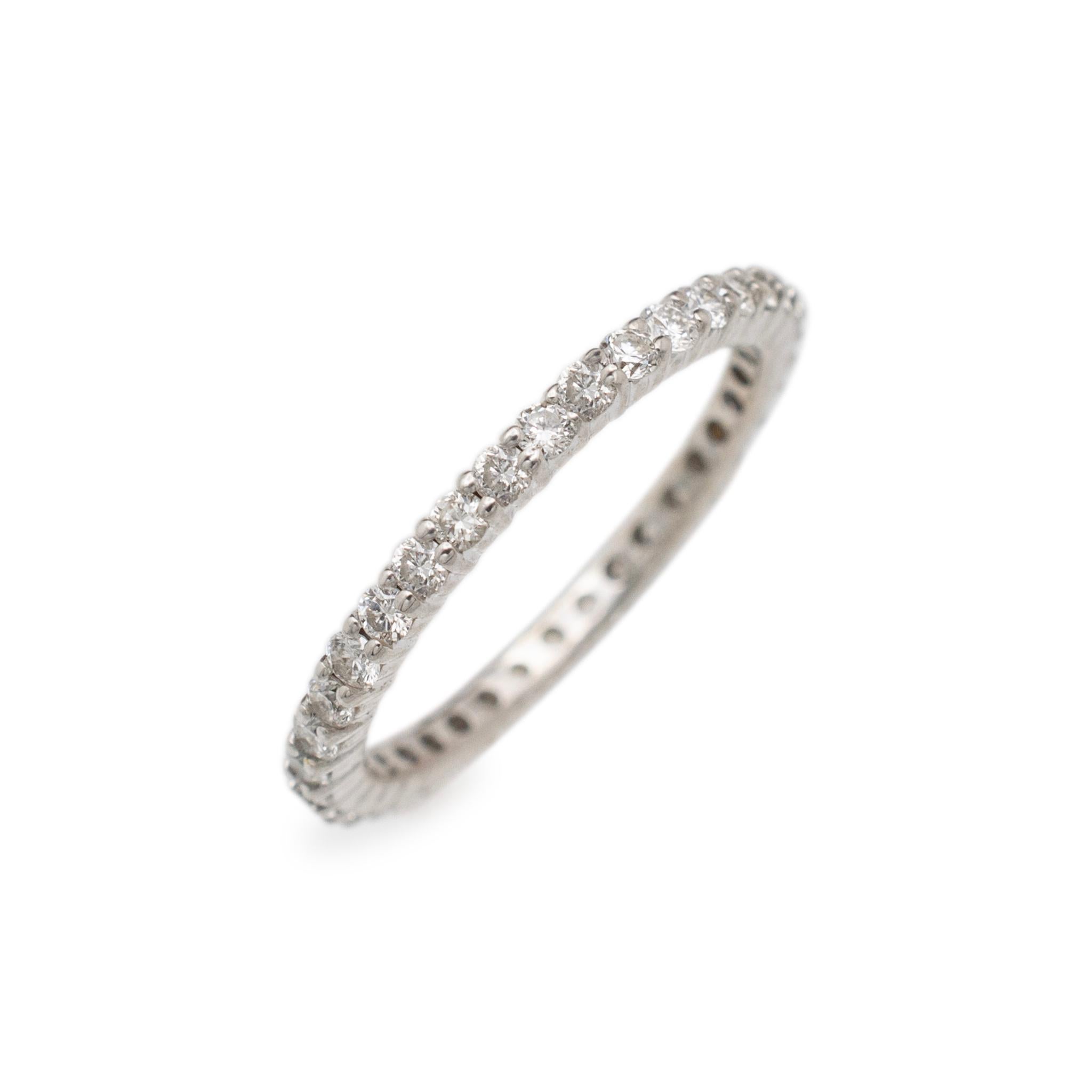 Gender: Ladies

Metal Type: 14K White Gold

Size: 5.5

Shank Maximum Width: 1.75 mm

Weight: 1.31 grams

Ladies 14K white gold diamond wedding eternity band with a half-round shank. The metal was tested and determined to be 14K white gold. Engraved