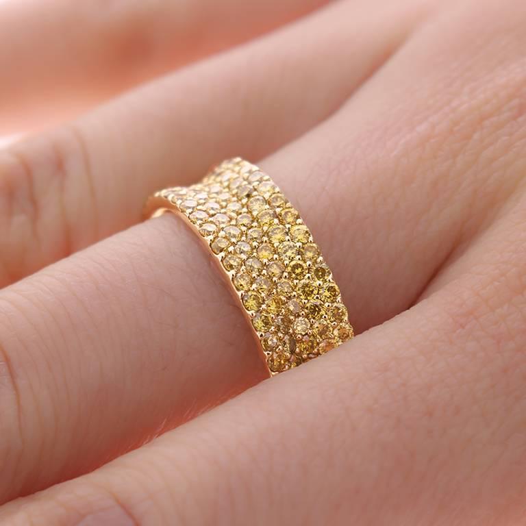 This Ladies 14k Natural Yellow Diamonds Band has 1.28 carats of perfectly Matched Yellow Diamonds. Comfort Fit Band for Everyday Use.