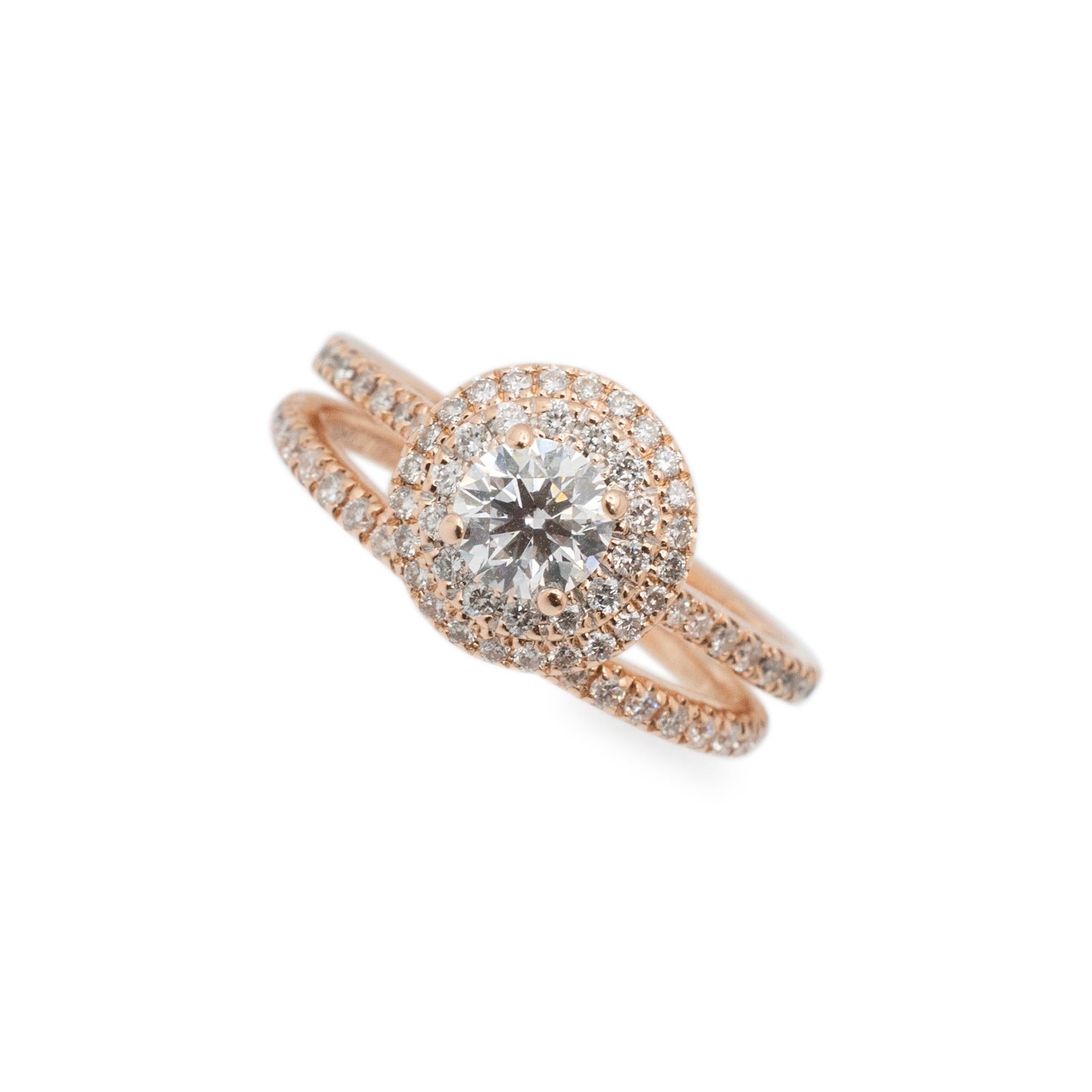 Gender: Ladies

Metal Type: 14K Rose Gold

Size: 4

Diameter: 9.50 mm

Ring Width: 1.50 mm

Band Width: 1.60 mm

Ring Weight: 2.79 grams

Band Weight: 1.43 grams

One ladies 14K rose gold diamond engagement, double-halo ring with a half round shank.