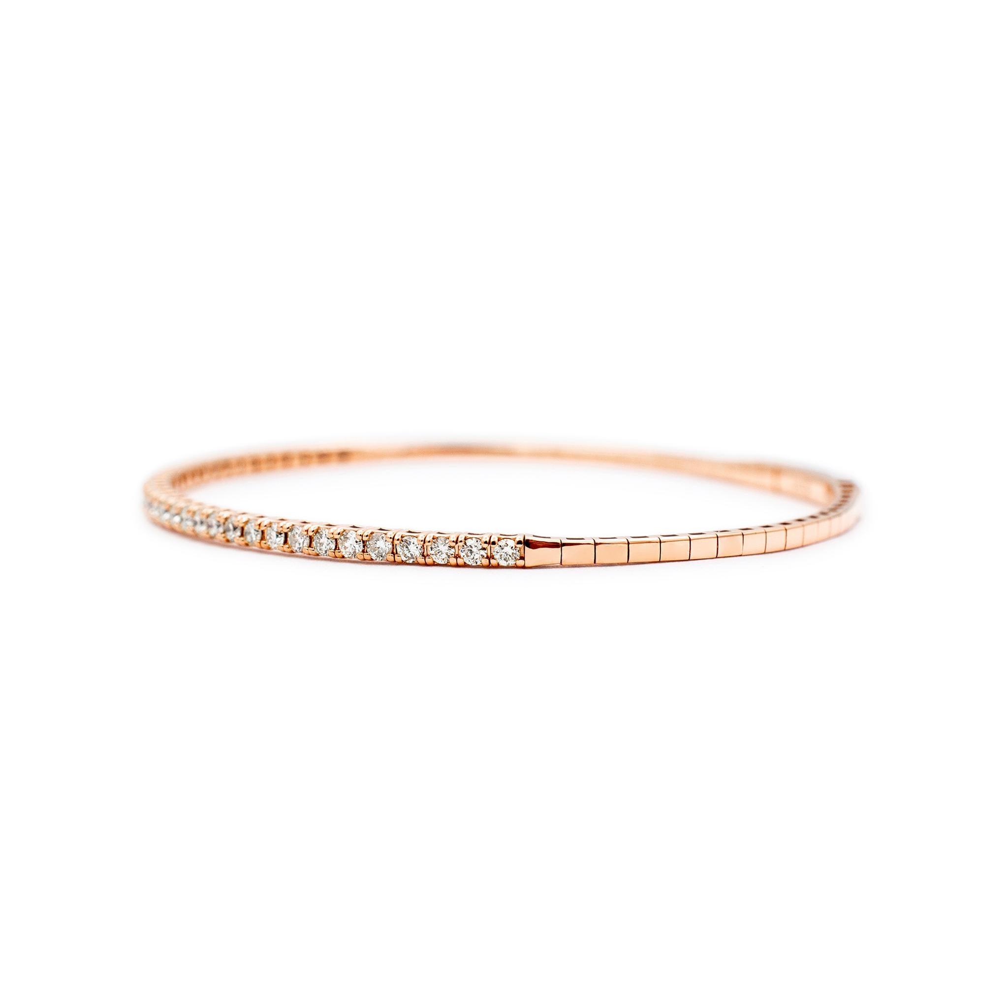 Gender: Ladies

Metal Type: 14K Rose Gold

Length: 6.50 inches

Width: 2.60 mm

Weight: 5.75 grams

Ladies custom made polished 14K rose gold, diamond tennis bracelet. The bracelet measures approximately 6.50 inches in length by 2.60 mm in width and