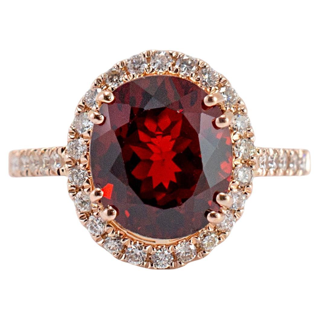Ladies 14K Rose Gold Garnet Halo Diamond Cocktail Ring