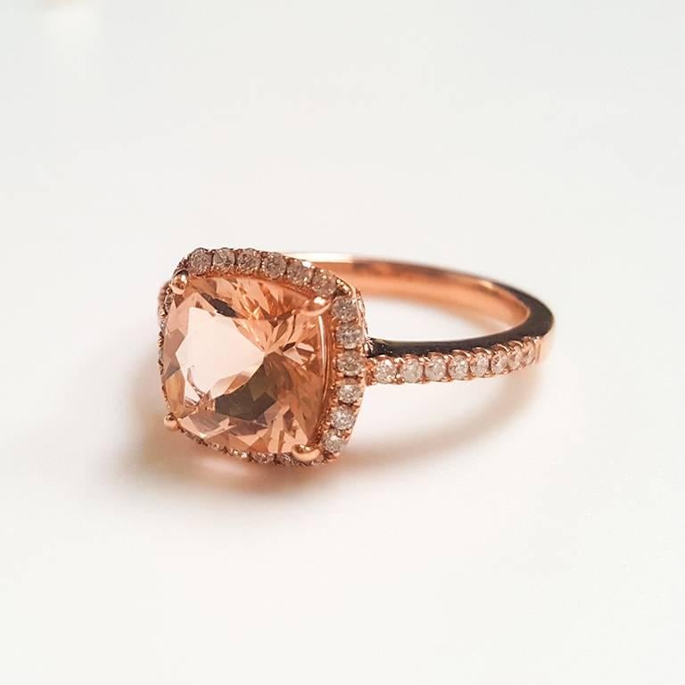 This Ladies 14k Rose Gold Morganite and Diamonds Ring has 1.80 carats of perfectly Matched Morganite and 0.37 carats of Diamonds. 
