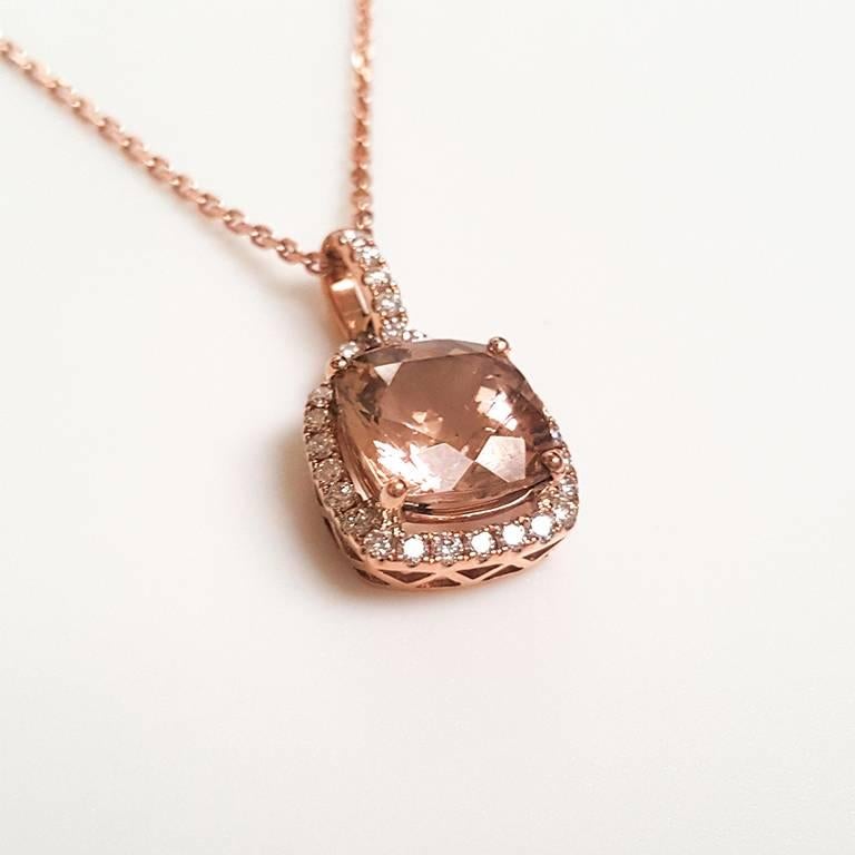 This Ladies 14k Rose Gold Peachy Morganite and Diamonds Pendant has 3.00 carats of Morganite and 0.36 carats of Diamonds. 