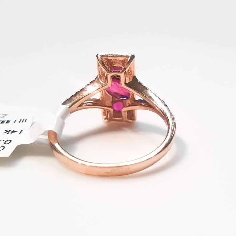 Oval Cut Ladies 14 Karat Rose Gold Rubies and Diamond Ring For Sale