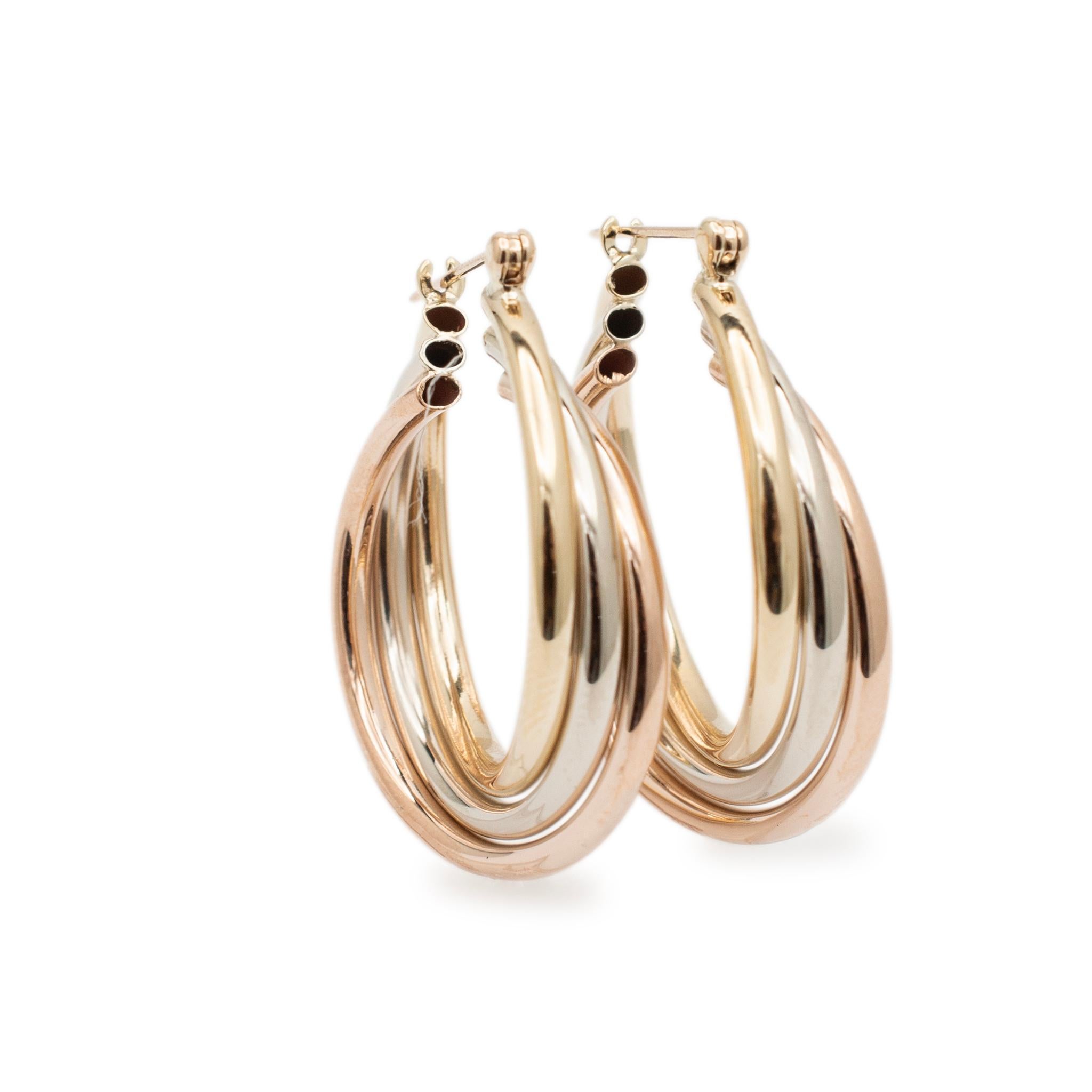 Gender: Ladies

Metal Type: 14K Rose, Yellow and White Gold

Length: 1.00 inches

Shank Width: 25.00 mm

Weight: 4.40 grams

Ladies 14K tri-color gold hoop trinity earrings with 