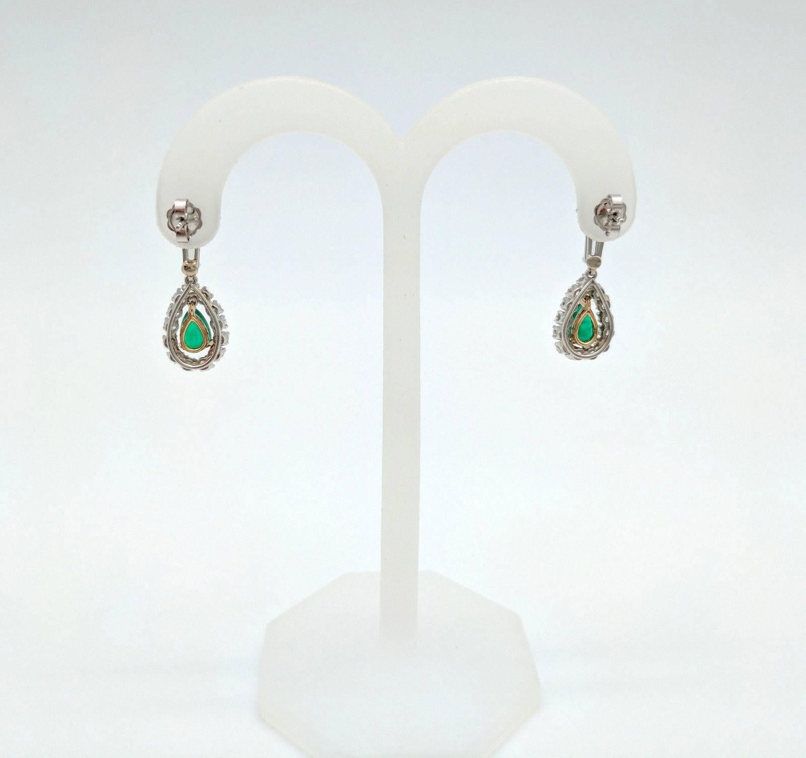 Ladies 14K Two-Tone 3.70ctw Emerald & Diamond Dangle/Drop Earrings SI1, G In Excellent Condition In Gainesville, FL