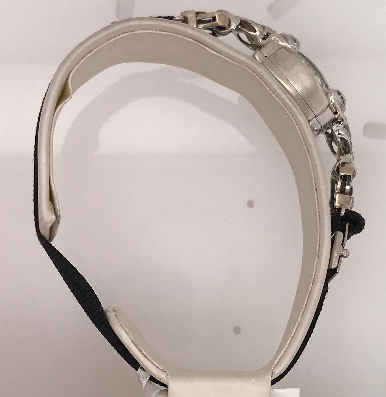 Round Cut Ladies 14 Karat White Gold 1940s Small Wristwatch For Sale