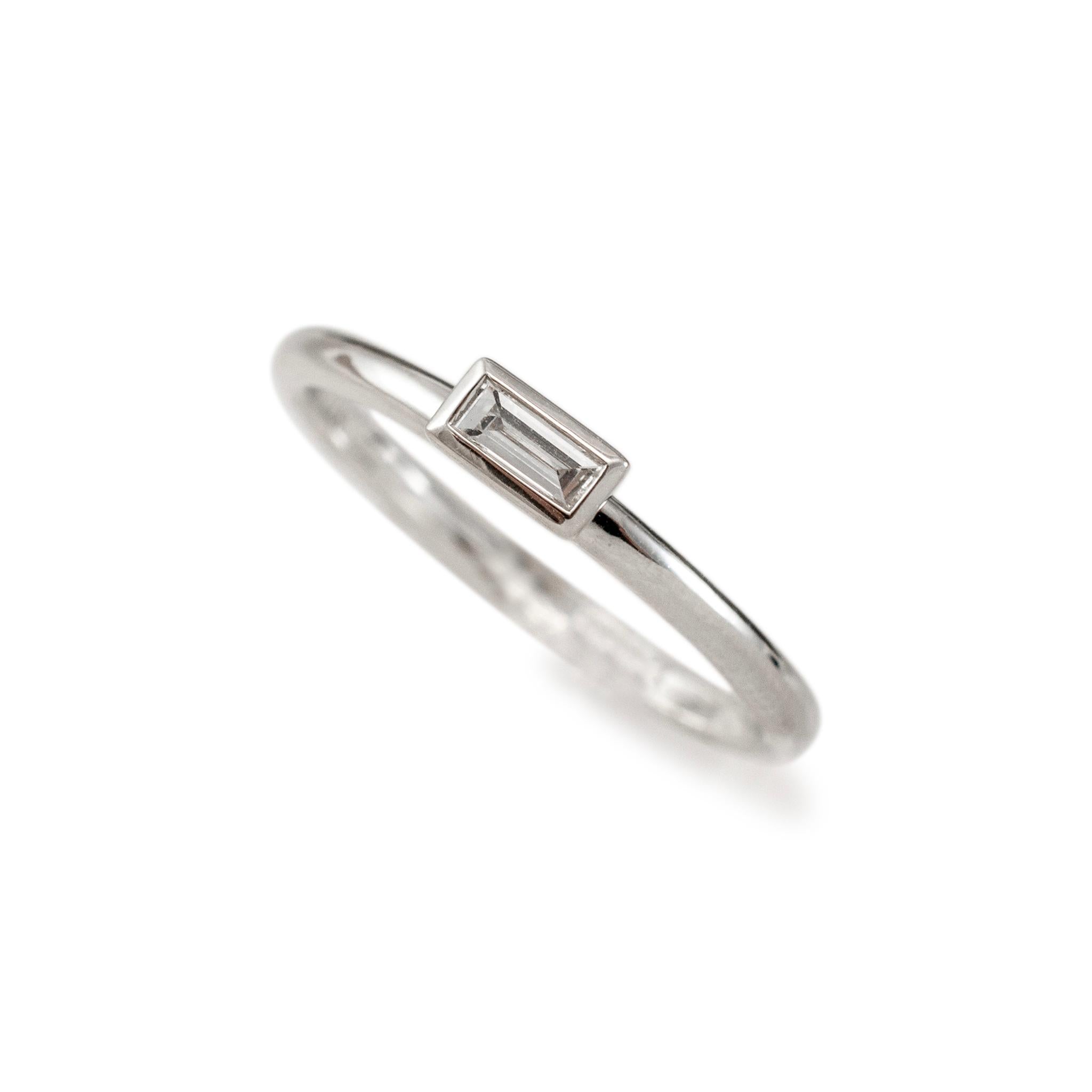 Gender: Ladies

Metal Type: 14K White Gold

Ring Size: 7

Shank Maximum Width: 1.85 mm

Weight: 1.97 grams

One ladies 14K White Gold diamond engagement ring with a half-round shank. The metal was tested and determined to be 14K white gold. Engraved