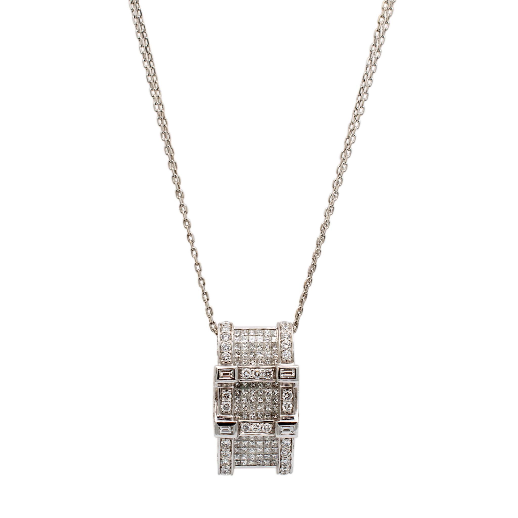 Gender: Ladies

Material: 14K White Gold

Chain Length: 17.00 inches

Pendant Measurements: 30mm x 23mm

Weight: 22.80 grams

Ladies 18K white gold double strand collar diamond necklace.
Engraved with 