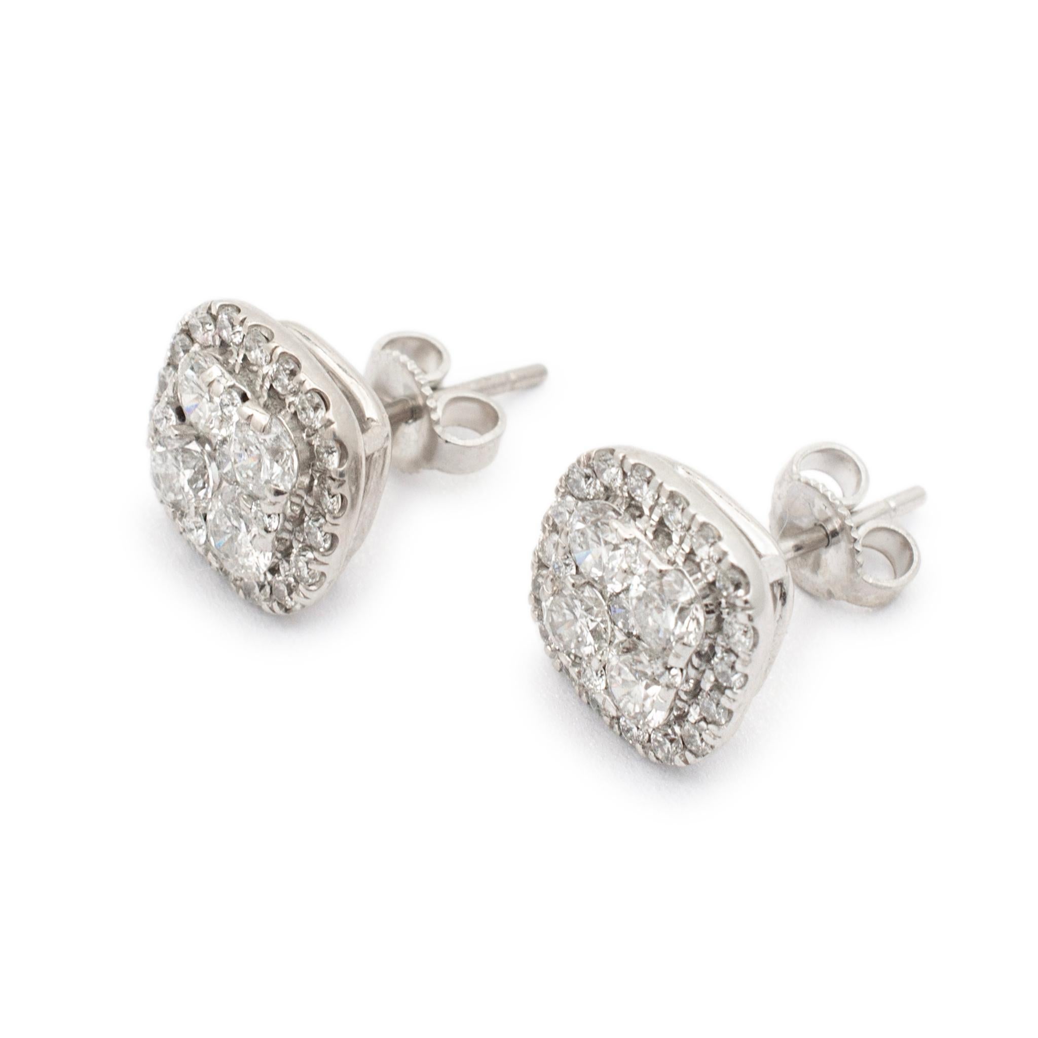Gender: Ladies

Metal Type: 14K White Gold

Length: 0.63 Inches

Width: 11.10 mm

Weight: 4.90 grams

Ladies 14K white gold diamond stud earrings with push backs. Engraved with 