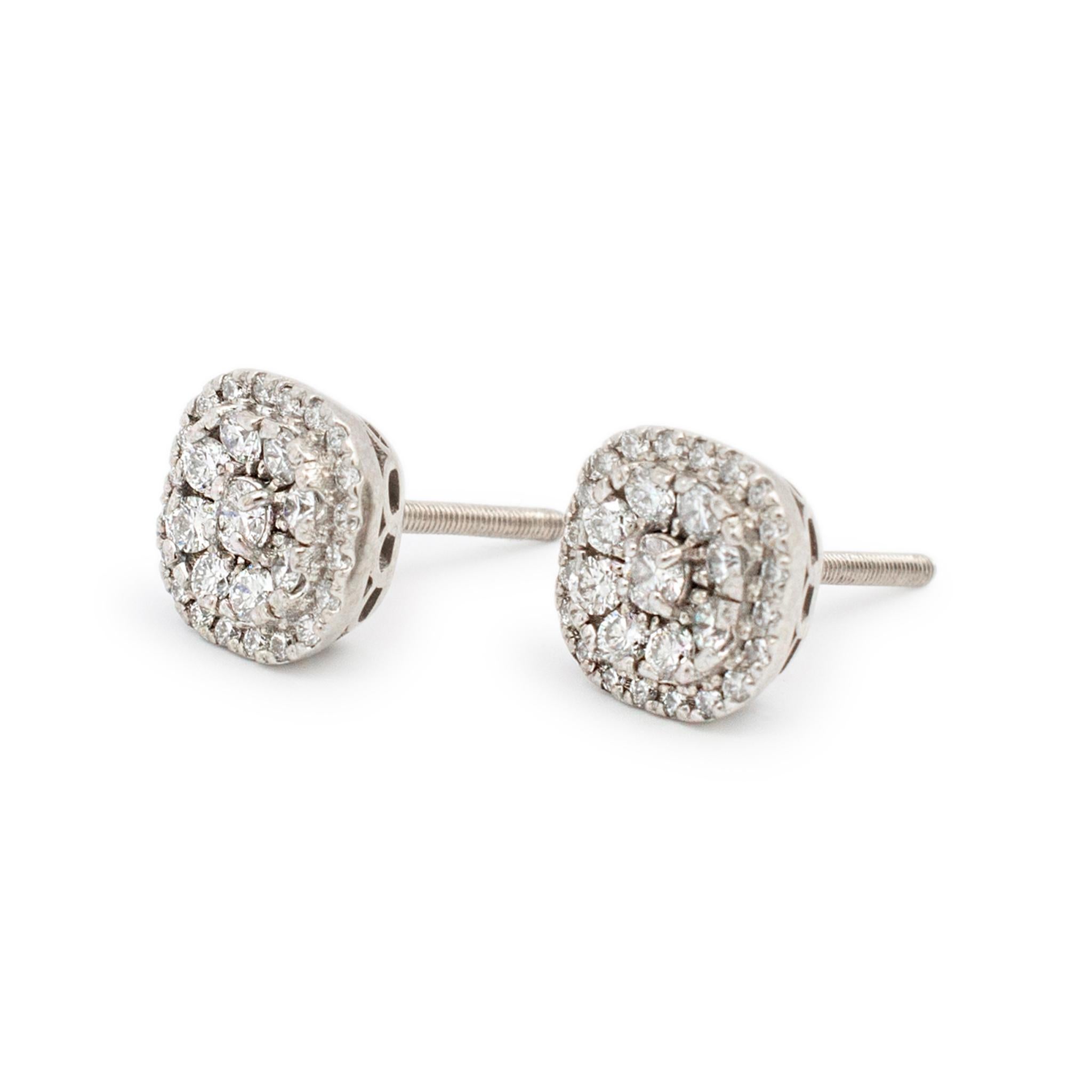 Gender: Ladies

Metal Type: 14K White Gold

Length: 0.50 inches

Width: 9.15 mm

Weight: 3.04 grams

14K White Gold diamond stud earrings with screw backs. The metal was tested and determined to be 14K white gold. Engraved with 