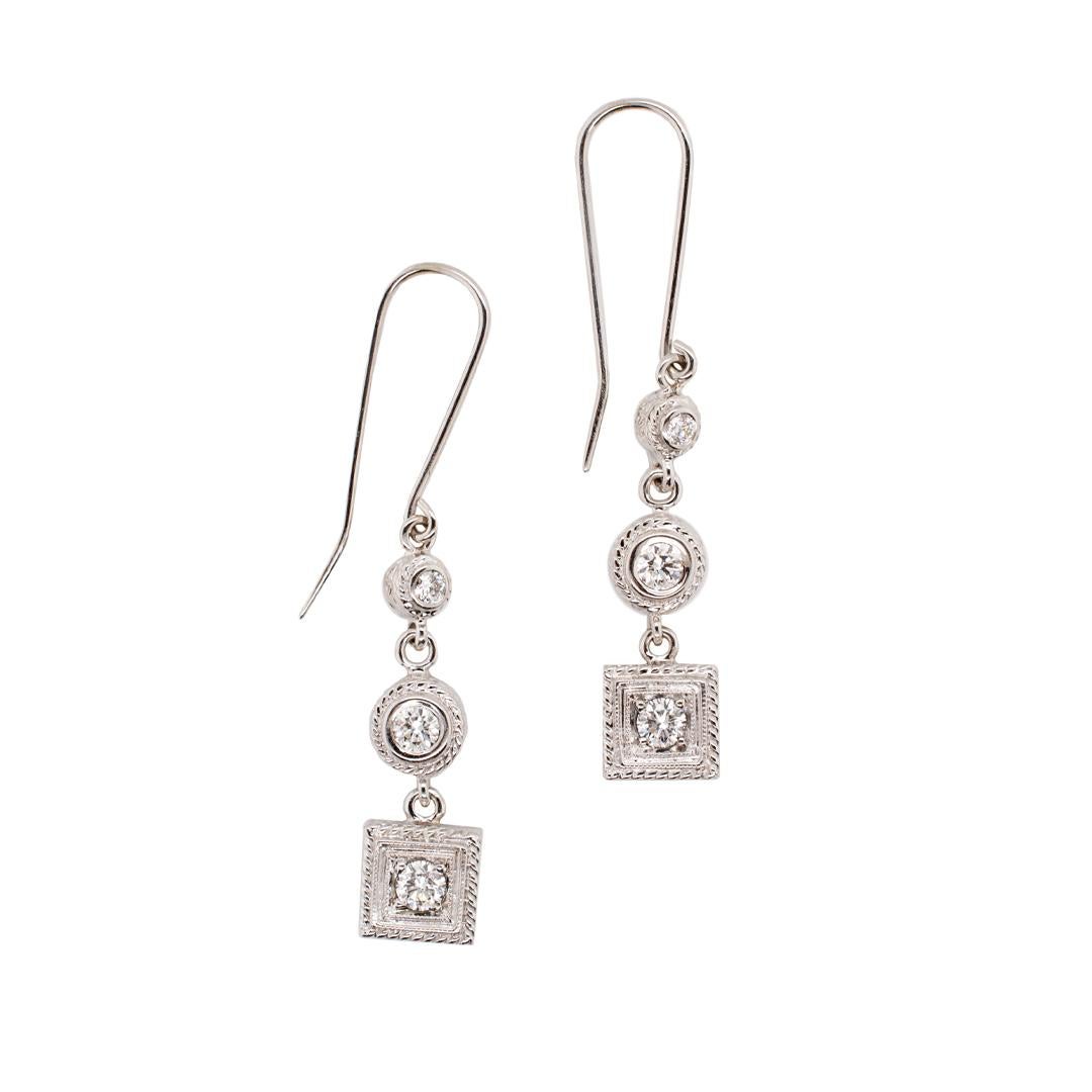 Ladies 14K White Gold Dangle Diamond Earrings In Excellent Condition For Sale In Houston, TX
