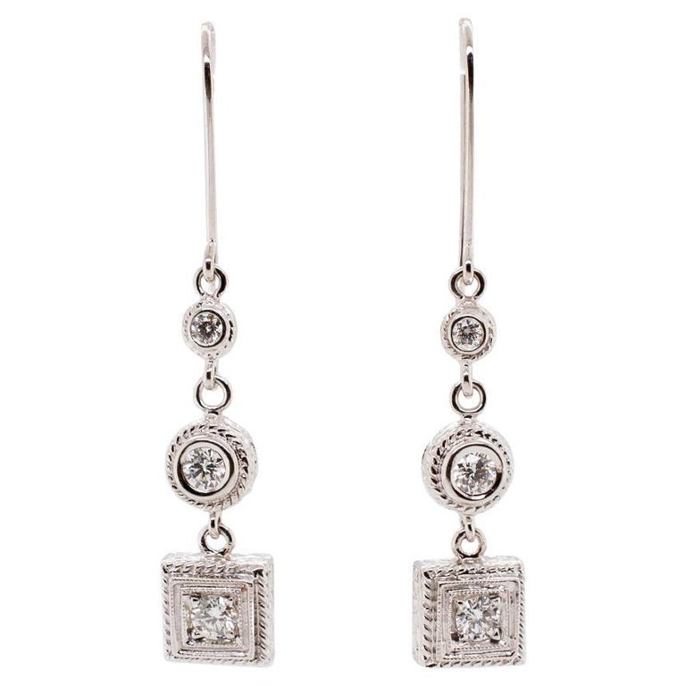 Ladies 14K White Gold Dangle Diamond Earrings For Sale at 1stDibs