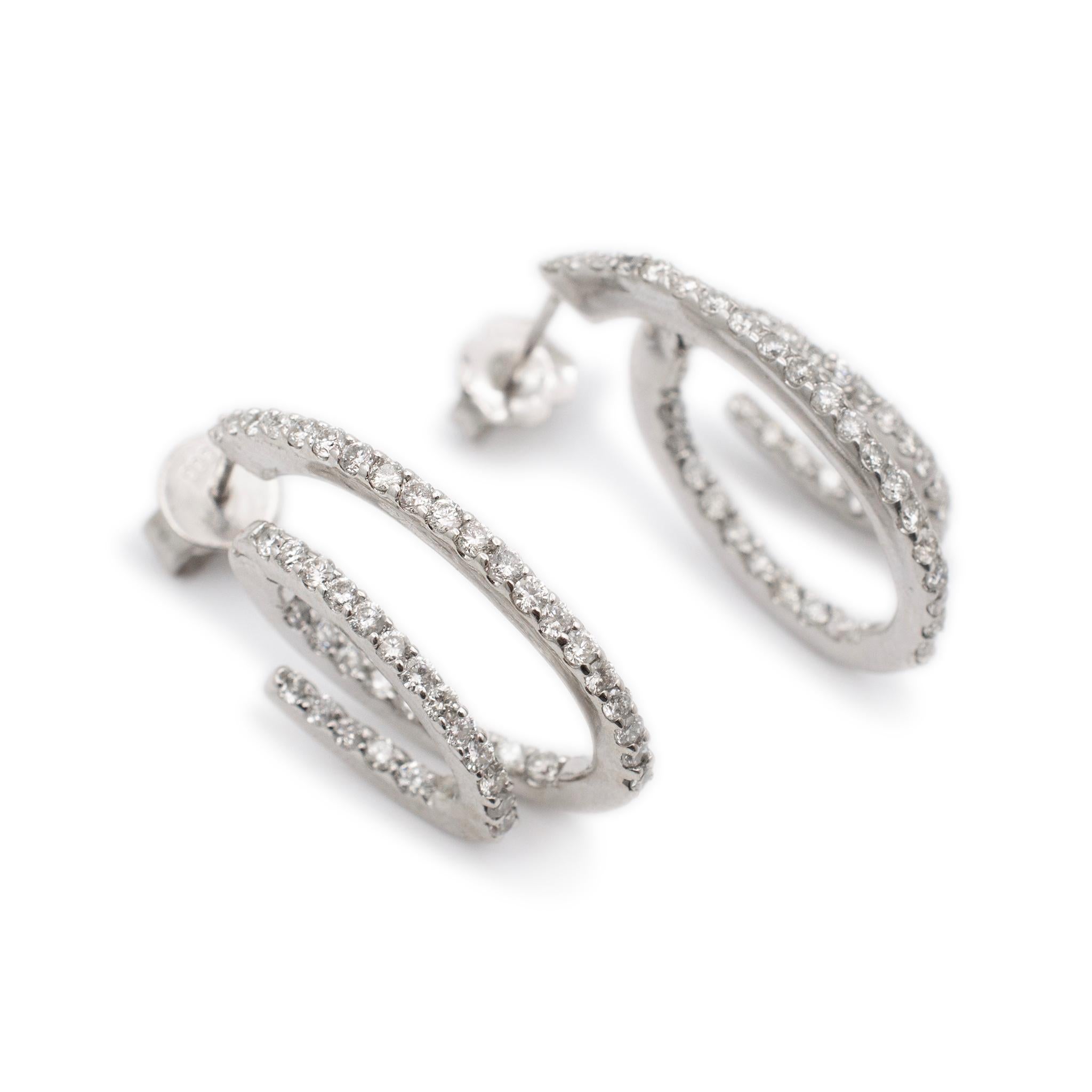 Gender: Ladies

Metal Type: 14K White Gold

Length: 1.00 inches

Width: 1.60 mm

Weight: 6.29 grams

14K White Gold diamond hoop earrings with push backs. Engraved with 