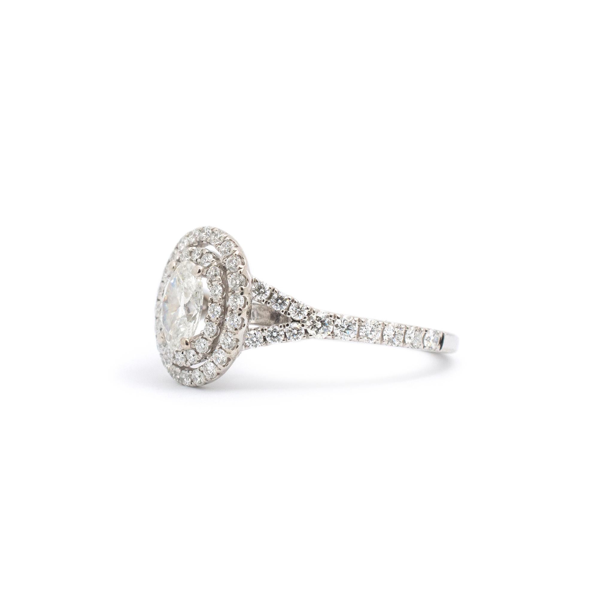 Gender: Ladies

Metal Type: 14K White Gold

Size: 5

Shank Maximum Width: 5.25 mm

Head Measures: 11.45mm x 10.10mm

Weight: 3.11 grams

Ladies 14K white gold diamond double-halo accented cluster ring with a half round shank. Engraved with