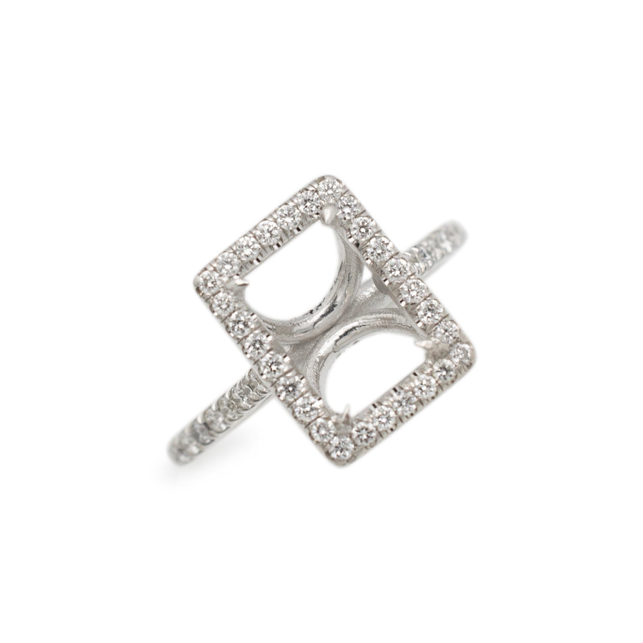 Gender: Ladies

Metal Type: 14K White Gold

Size: 4.75

The semi-mount can accommodate a rectangular stone measuring between 8.90mm to 9.10mm in length by 6.40mm to 6.60mm in width.

Head measurements: 11.70mm x 9.00mm

Shank maximum width: