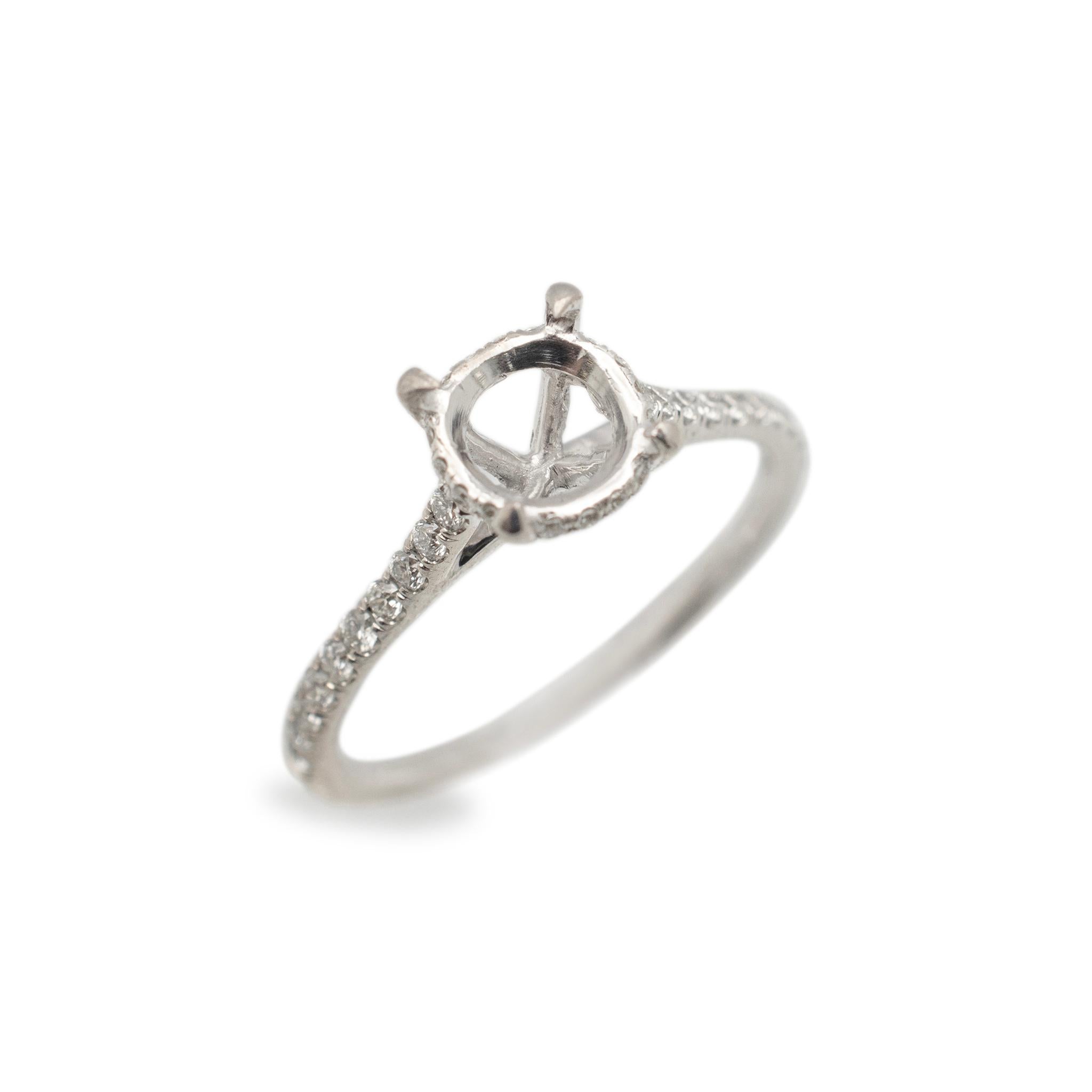 Gender: Ladies

Metal Type: 14K White Gold

Size: 4.75

Shank Maximum Width: 1.50 mm

Weight: 1.48 grams

Ladies 14K white gold diamond engagement semi-mount accented hidden halo ring with a half round shank. The metal was tested and determined to