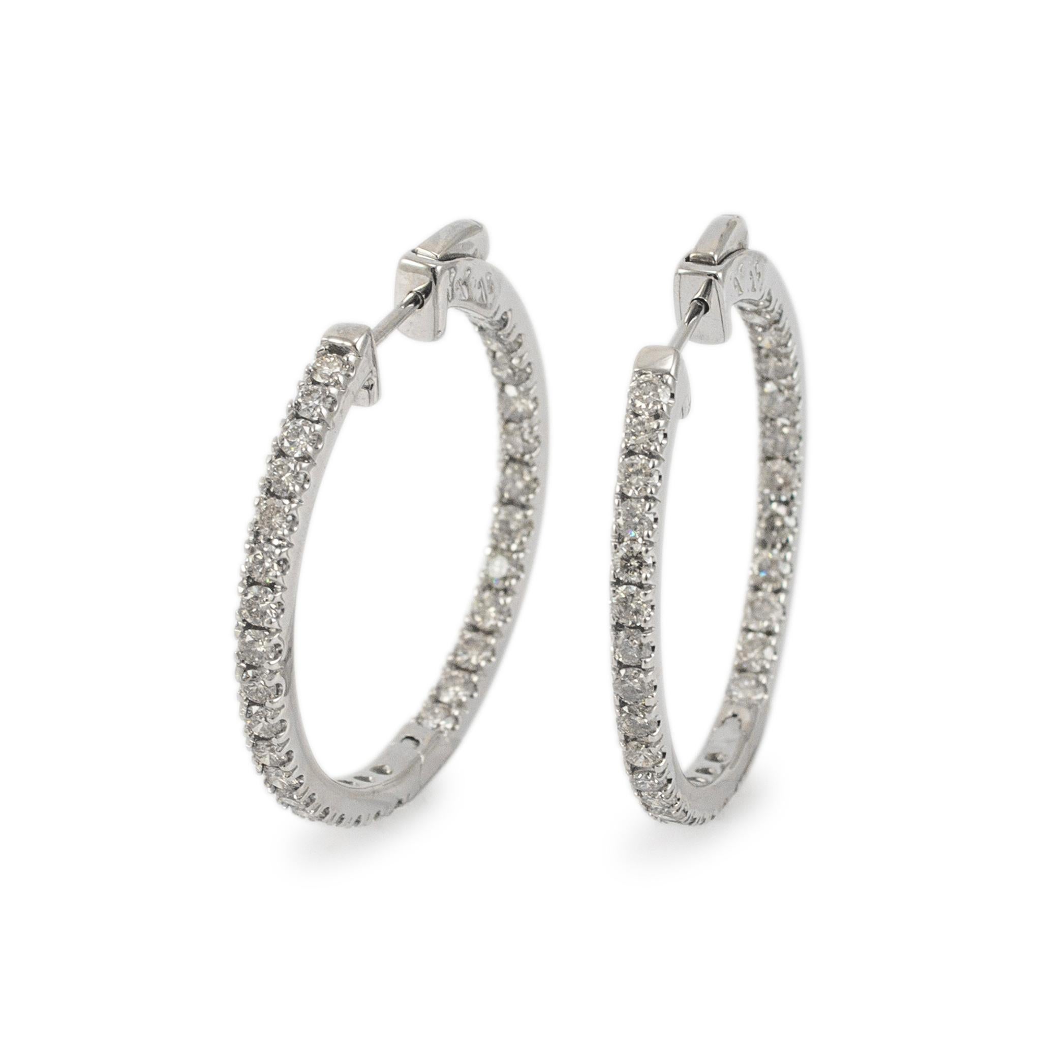 Gender: Ladies

Metal Type: 14K White Gold

Diameter: 33.00 mm

Weight: 10.45 grams

One pair of ladies 14K White Gold Diamond hoop earrings with locking backs. The metal was tested and determined to be 14K white gold. Engraved with 