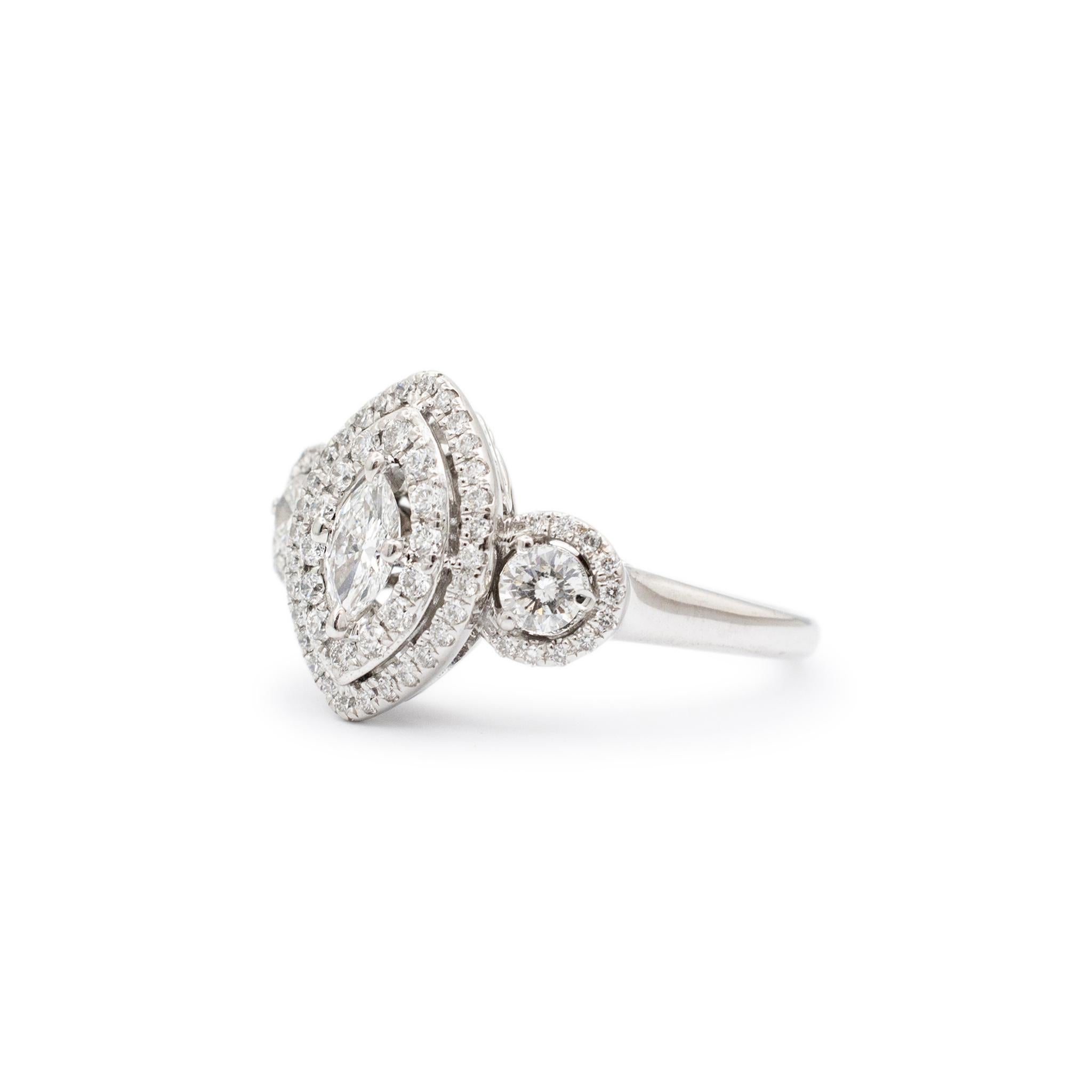 Gender: Ladies

Metal Type: 925 Sterling Silver

Size: 8

Head Measurement: 14.55mm x 18.45mm

Shank Maximum Width: 3.15mm

Weight: 4.73 grams

14K White Gold diamond engagement three-stone, halo ring with a half round shank.  The metal was tested