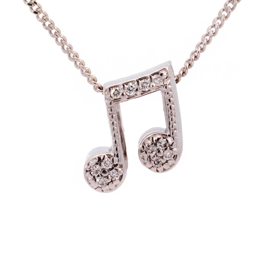 Gender: Ladies

Metal Type: 14K White Gold

Length: 18.00 Inches

Width: 1.18mm

Pendant measurements: 10.70mm x 10.00mm

Weight: 4.79 grams

Ladies 14K white gold single strand collar diamond necklace.
Engraved with 