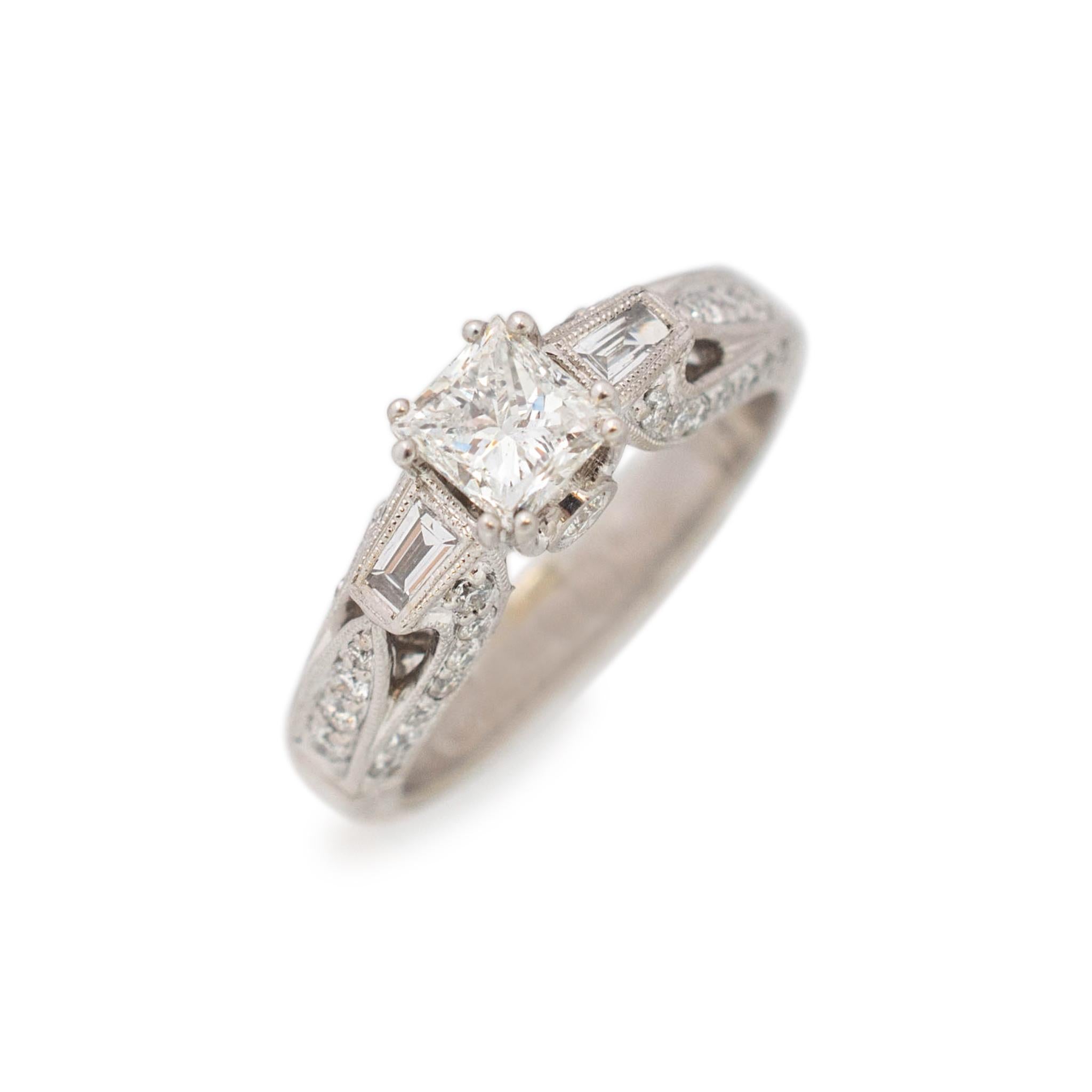 

 Gender: Ladies

Metal Type: 14K White Gold

Ring Size: 7.5

Shank Width: 4.40mm

Total weight: 5.80 grams

Ladies 14K white gold three-stone diamond three-stone engagement ring with a soft-square shank.
Engraved with 