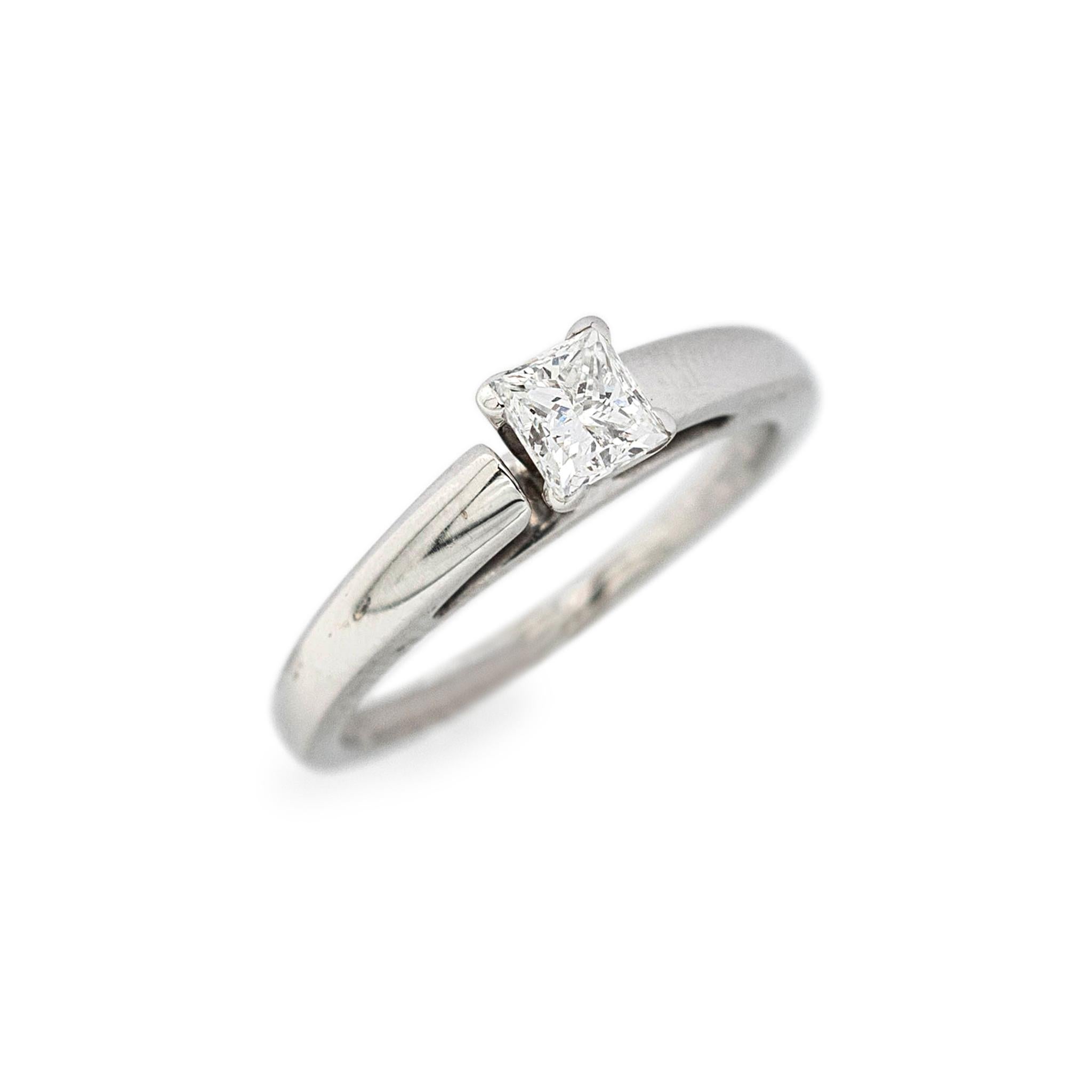 Gender: Ladies

Material: 14K White Gold

Size: 7.75

Shank Width: 3.10mm

Weight: 4.40 grams

Ladies 14K white gold, diamond solitaire engagement ring with a half round shank.
Engraved with 