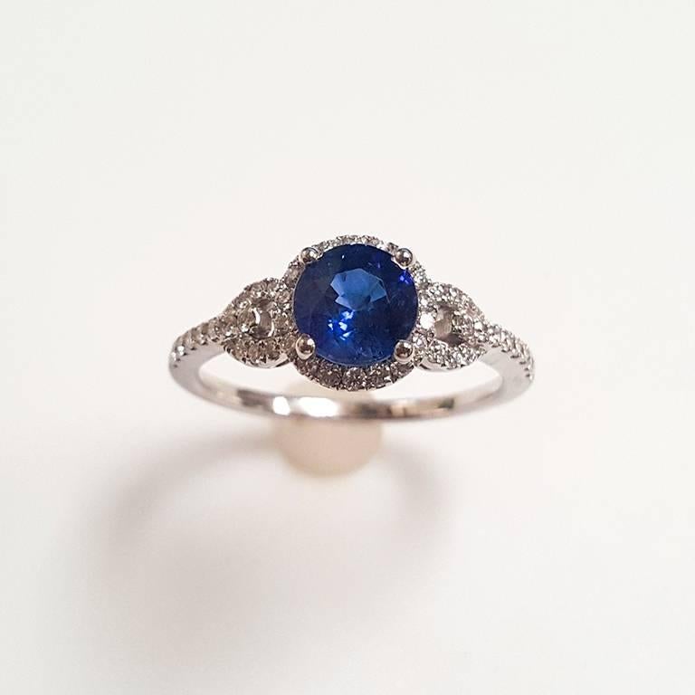 This Ladies 14k White Gold Sapphire and Diamonds Ring has 1.12 carats of Sapphire and 0.35 carats of Diamonds. 
