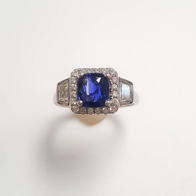This Ladies 14k White Gold Sapphire and Diamonds Ring has 2.02 carats of Sapphire, 0.43 carats of Perfectly Matched Trapezoid Diamonds and 0.28 Round Diamonds