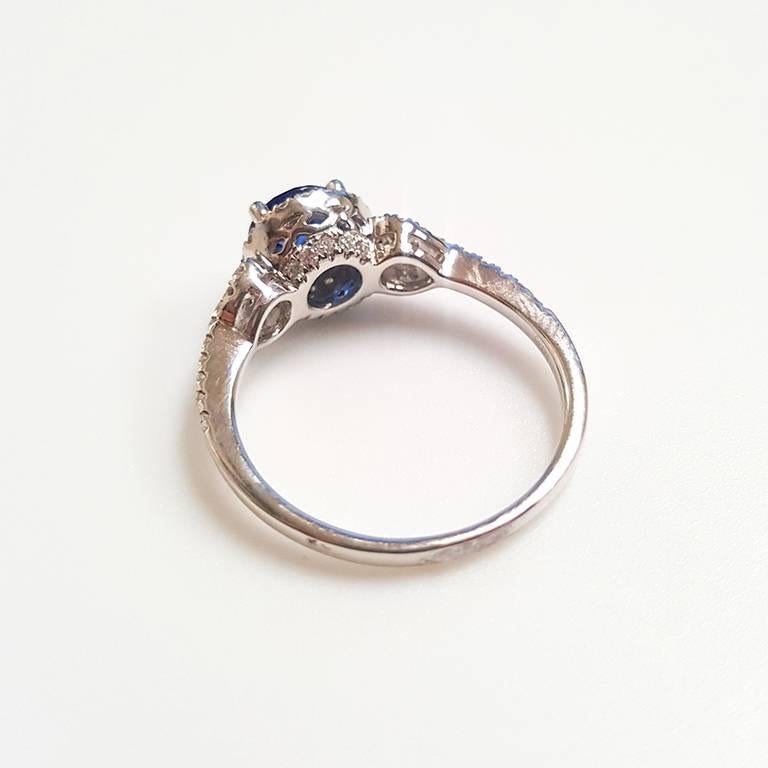 Round Cut Ladies 14 Karat White Gold Sapphire and Diamonds Ring For Sale