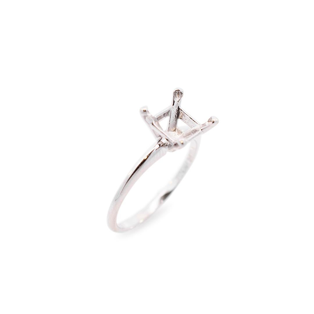 Gender: Ladies

Metal Type: 14K White Gold

Size (US): 6.75

Shank Width: 2.50mm

Hold a center stone of Princesses Cut, Square Emerald or Any Square Shape measures approximately 7.00mm to 7.70mm in diameter.

Weight: 2.21 grams

Ladies 14K white