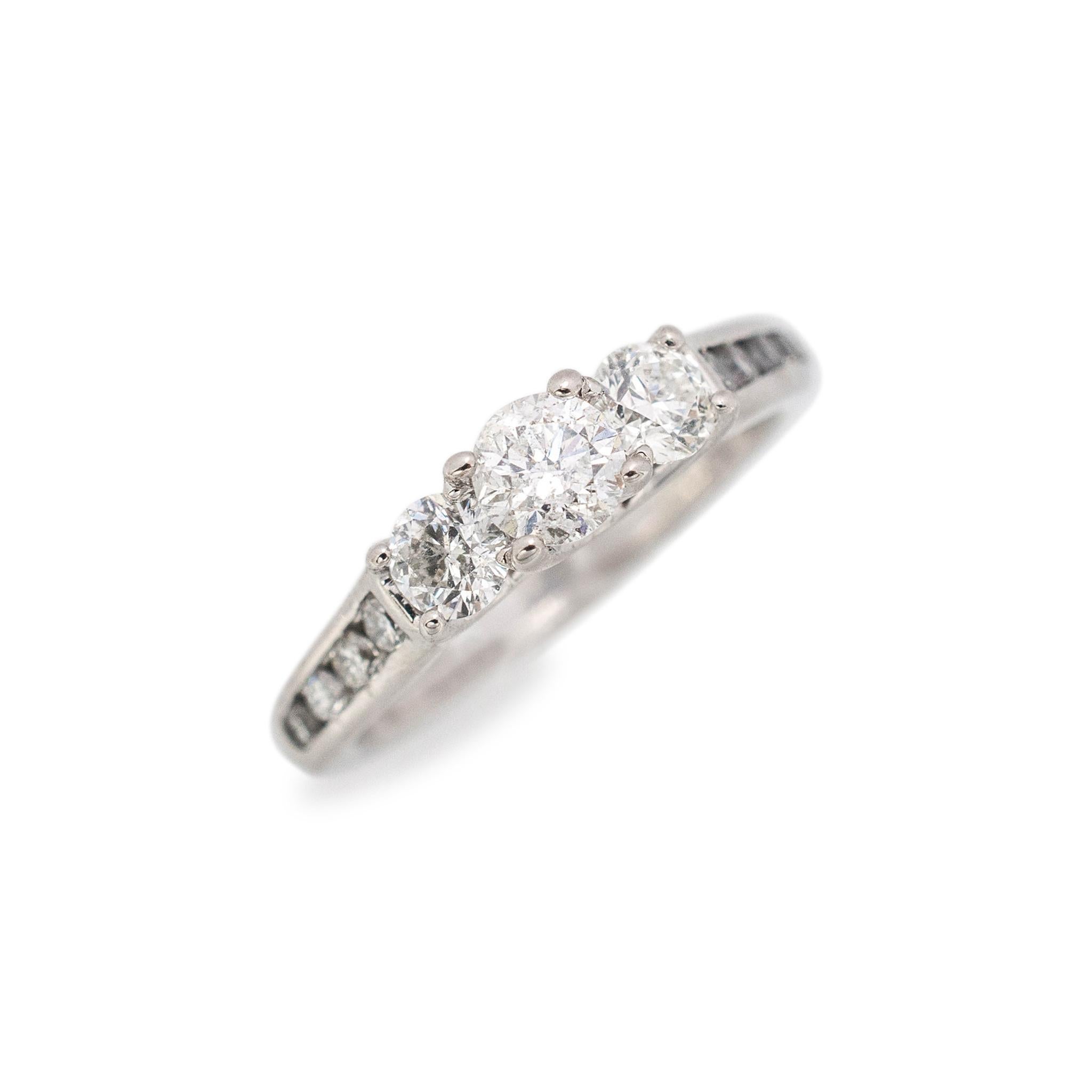 Gender: Ladies

Material: 14K White Gold

Size: 5.5

Weight: 2.90 grams

Ladies 14K white gold diamond engagement three-stone ring with a half round shank. Pre-owned in excellent condition. Might show minor signs of wear.

4-Prong Set in 14 Karat