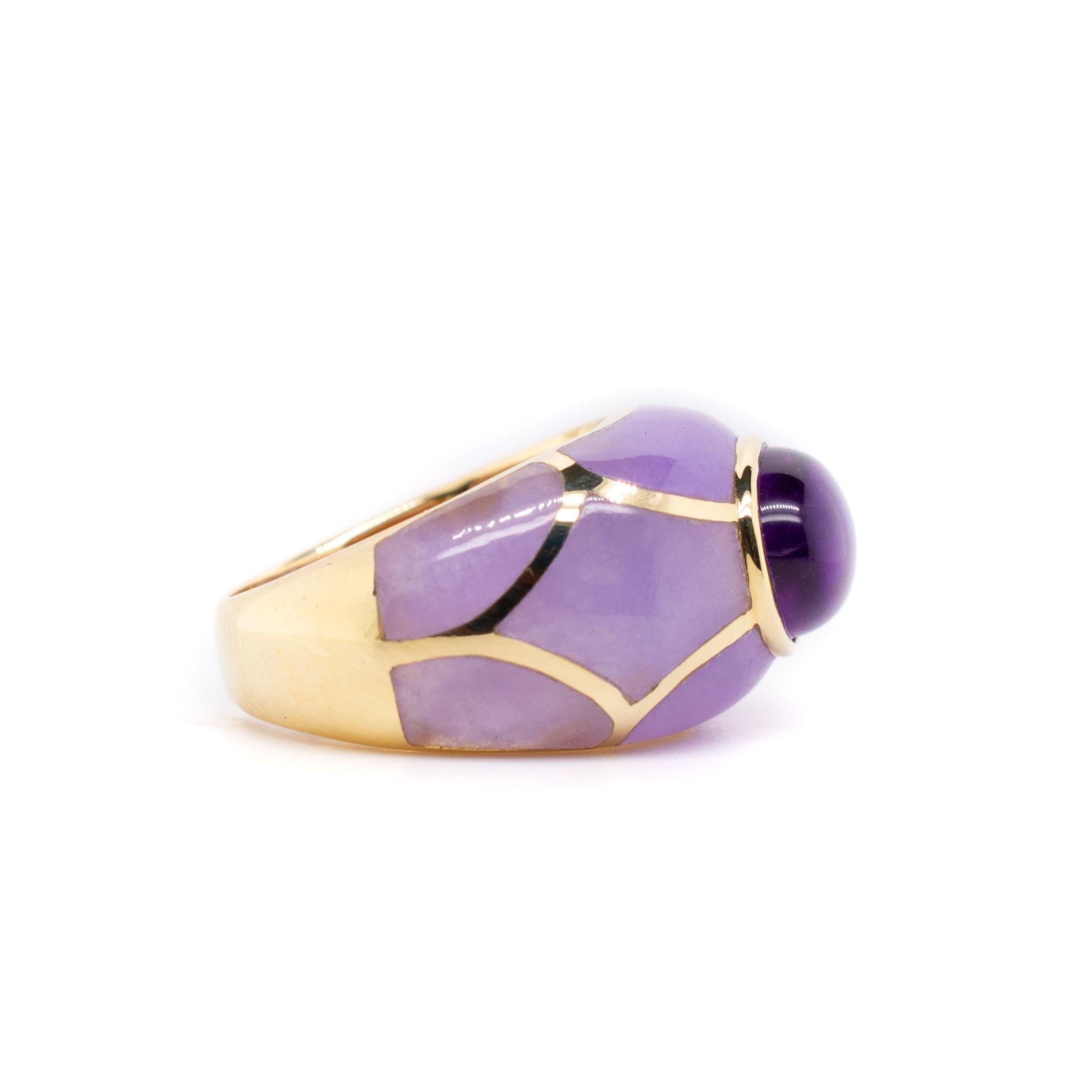 One lady's custom made polished 14K yellow gold, amethyst cocktail ring with a half round shank. The ring is a size 7. The ring weighs a total of 7.20 grams. Engraved with 