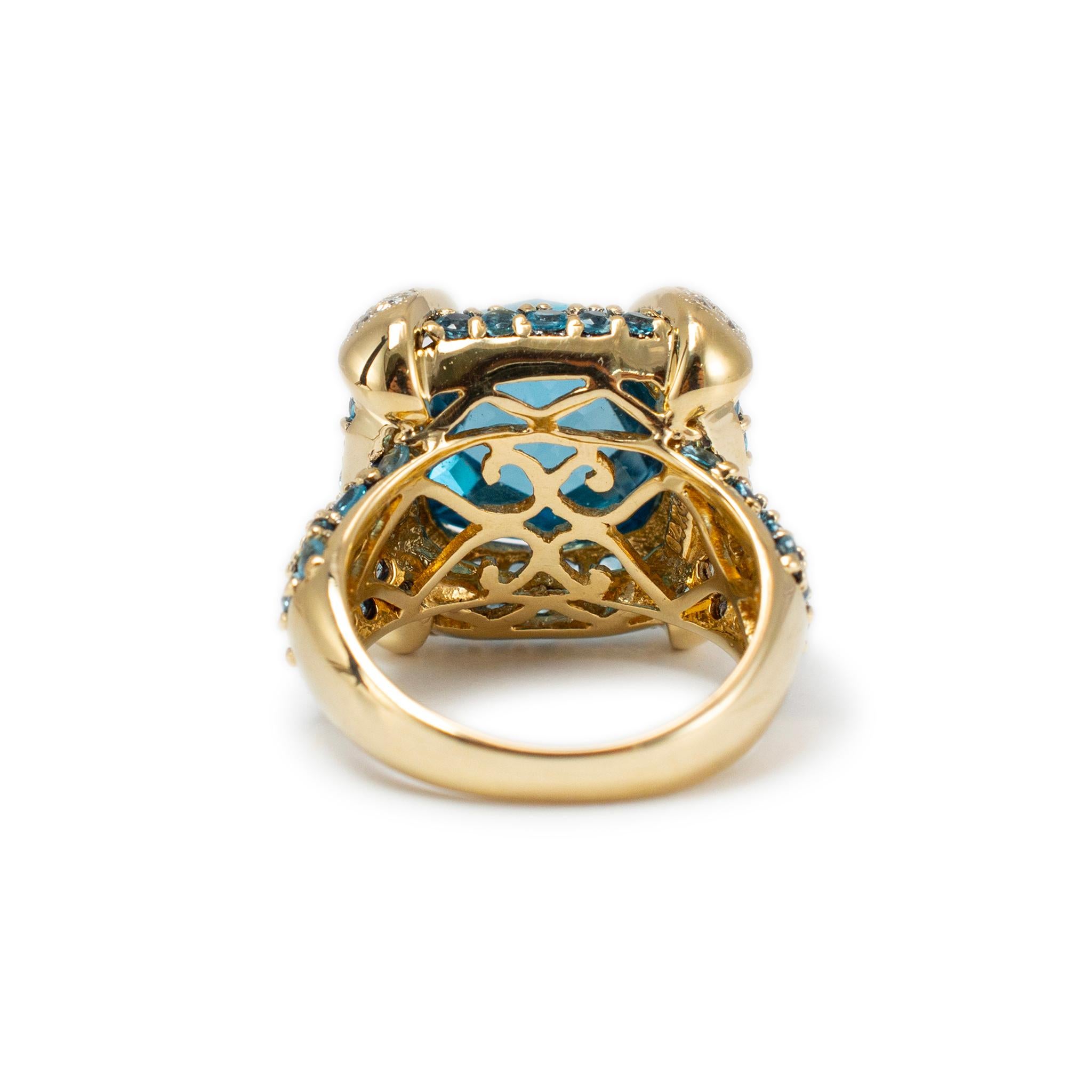 Donna Anello da donna in oro giallo 14 carati con aureola di topazio blu e diamanti in pavé in vendita