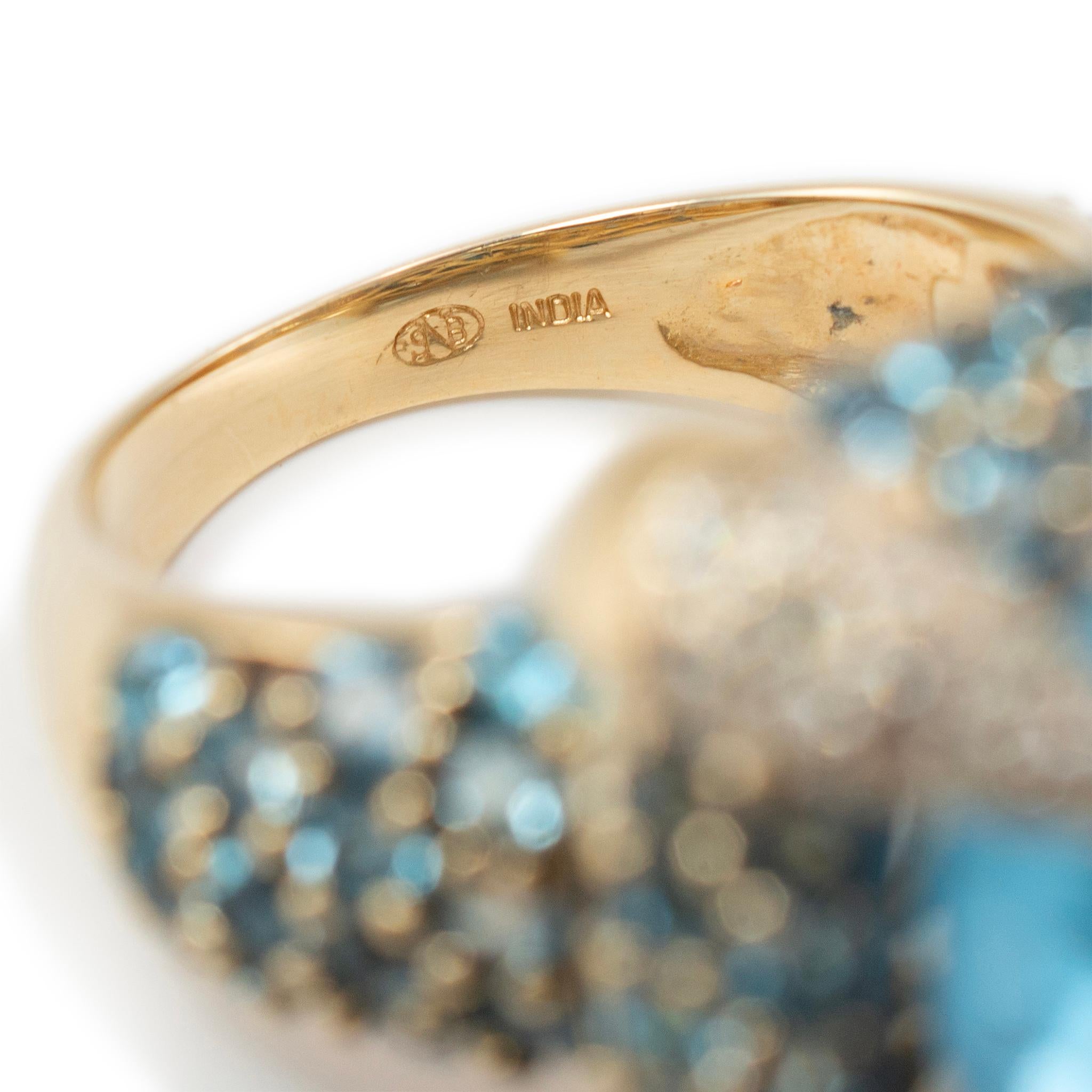 Anello da donna in oro giallo 14 carati con aureola di topazio blu e diamanti in pavé in vendita 1
