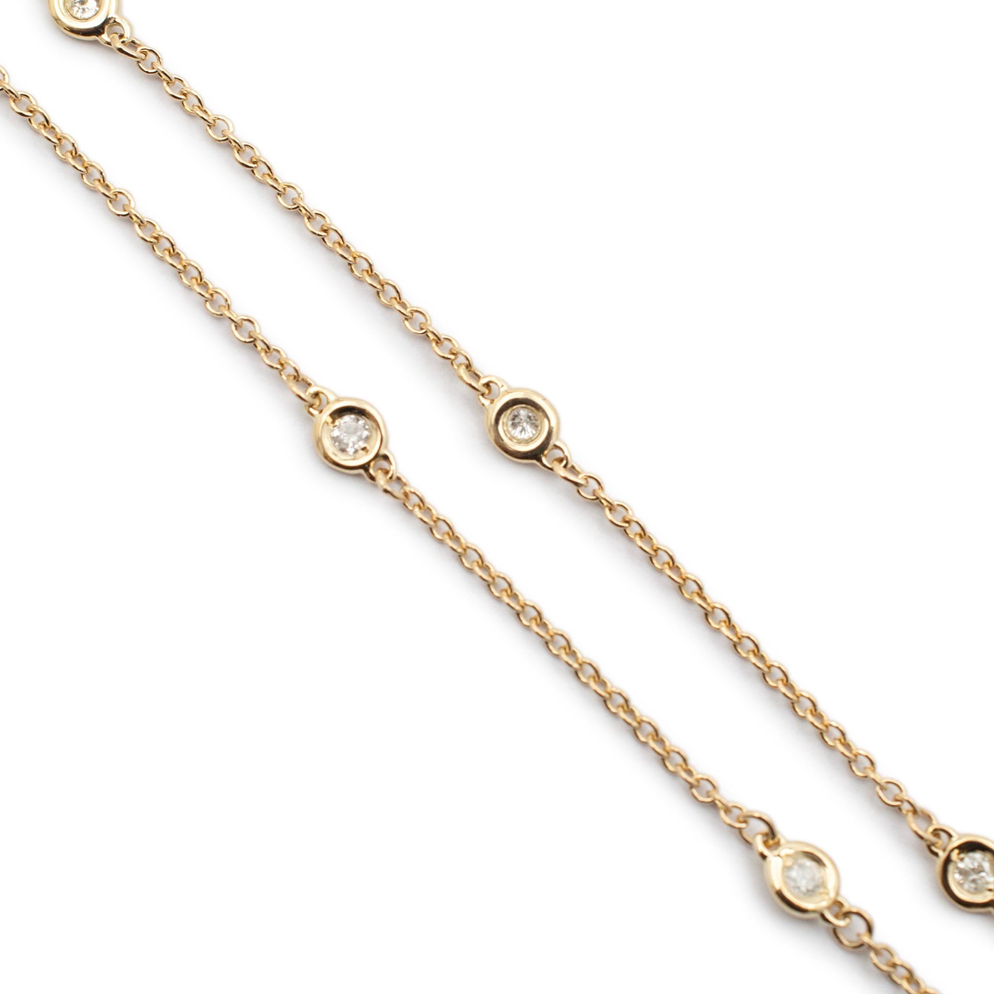 Gender: Ladies

Metal Type: 14K Yellow Gold

Length: 18.00 inches

Width: 1.25 mm

Weight: 2.30 grams

Ladies 14K yellow gold single strand diamond necklace. T Engraved with 