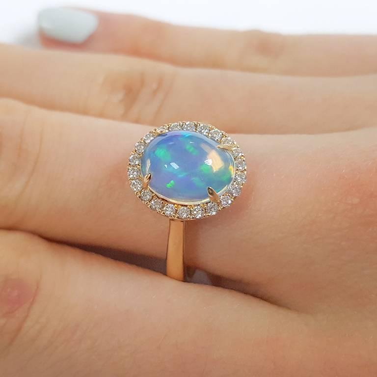 Oval Cut Ladies 14 Karat Yellow Gold Ethiopian Opal and Diamonds Ring