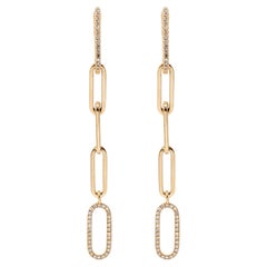 Pendientes colgantes ovalados de oro amarillo de 14 quilates con clip de diamantes