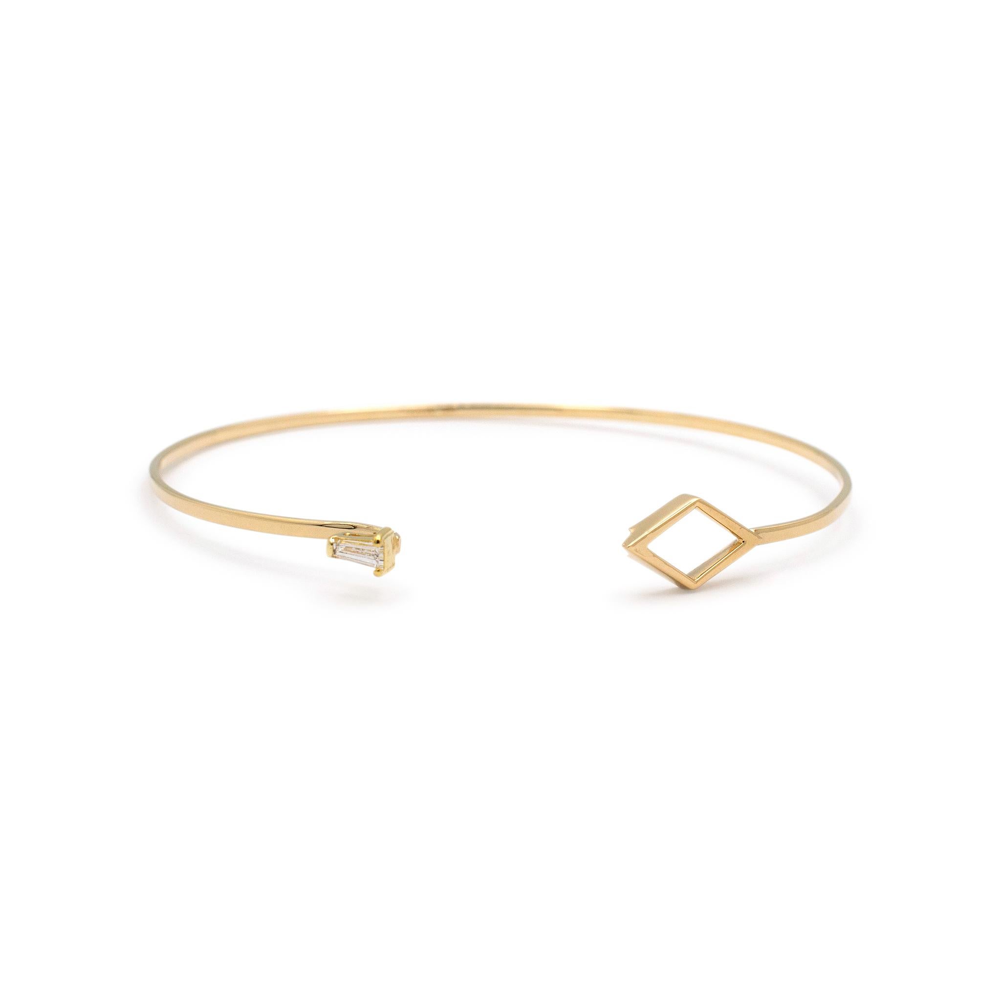 Gender: Ladies

Metal Type: 14K Yellow Gold

Length: 6.75 inches

Width: 1.70 mm

Rhombus Measurements: 15.00mm x 8.15mm

Weight:  4.56 grams

14K yellow gold diamond bangle bracelet. The metal was tested and determined to be 14K yellow gold.